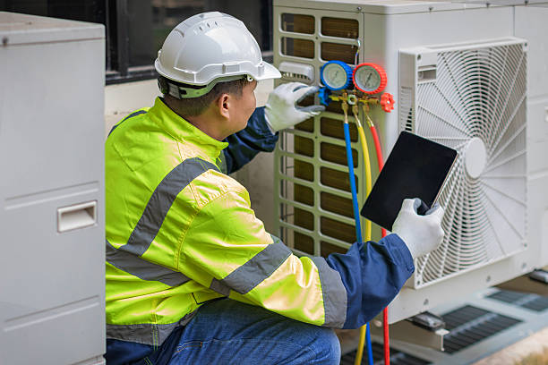Professional Hvac technician working in Rossville, GA